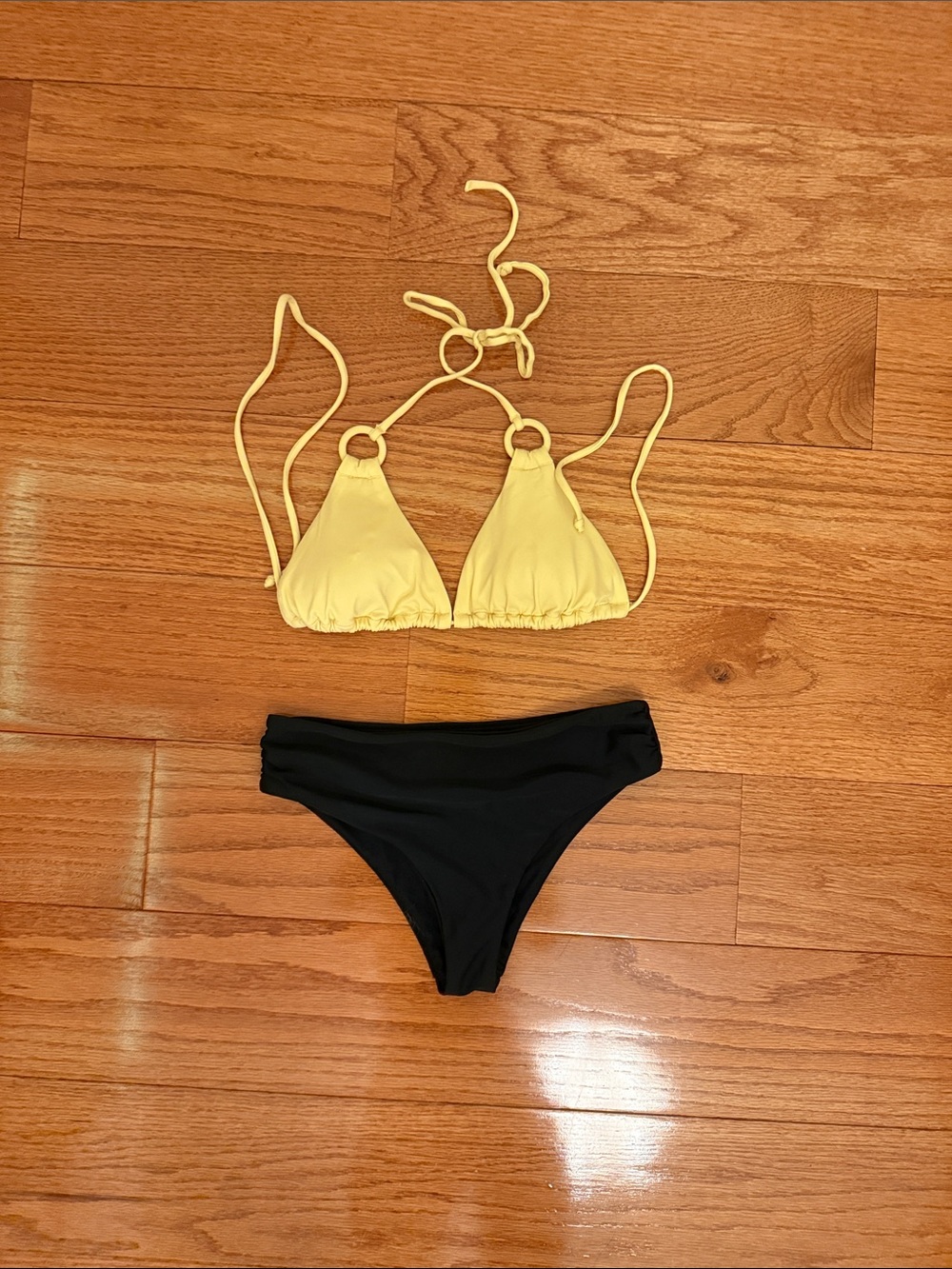 Two piece yellow and black swimsuit